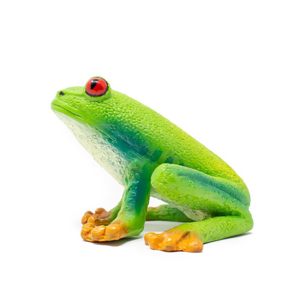 rubber tree frog toy with red eyes