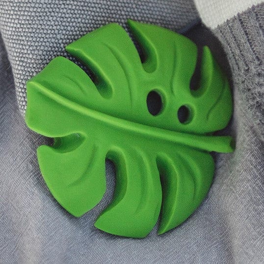 Lanco rubber teether in the shape of a green Monstera Leaf 