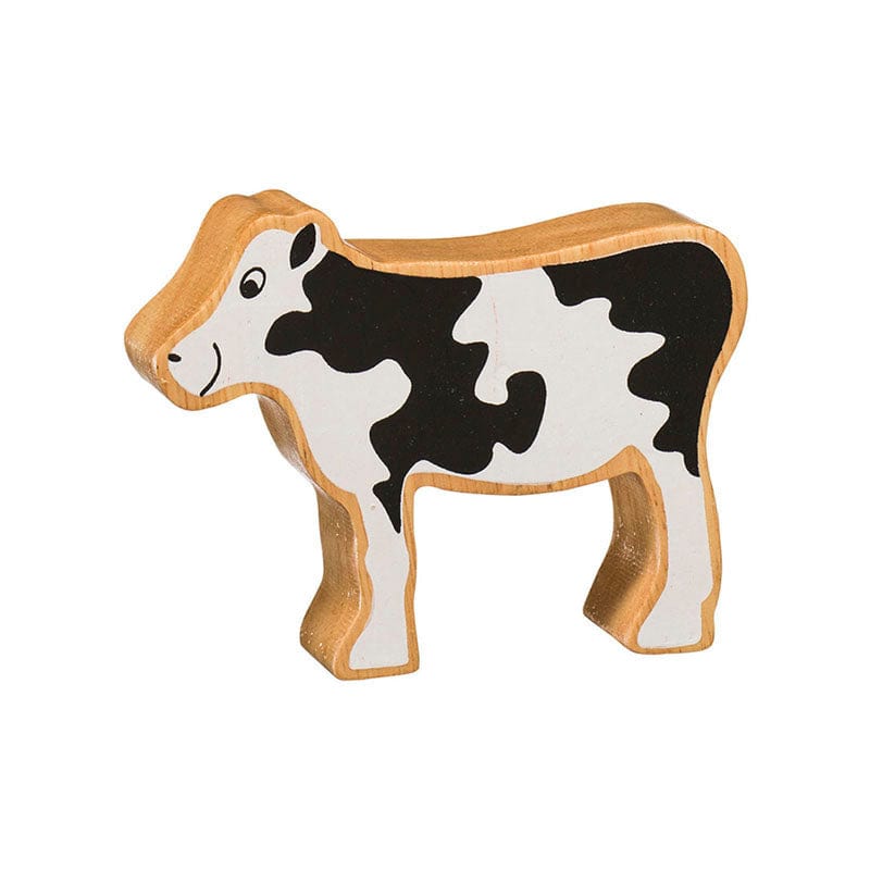 black and white wooden calf figure by lanka kade with a natural wood grain edge