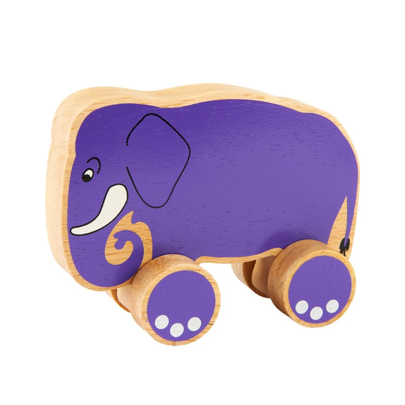 A bright purple and natural wood coloured push along elephant toy with a smiling face and white wheels.