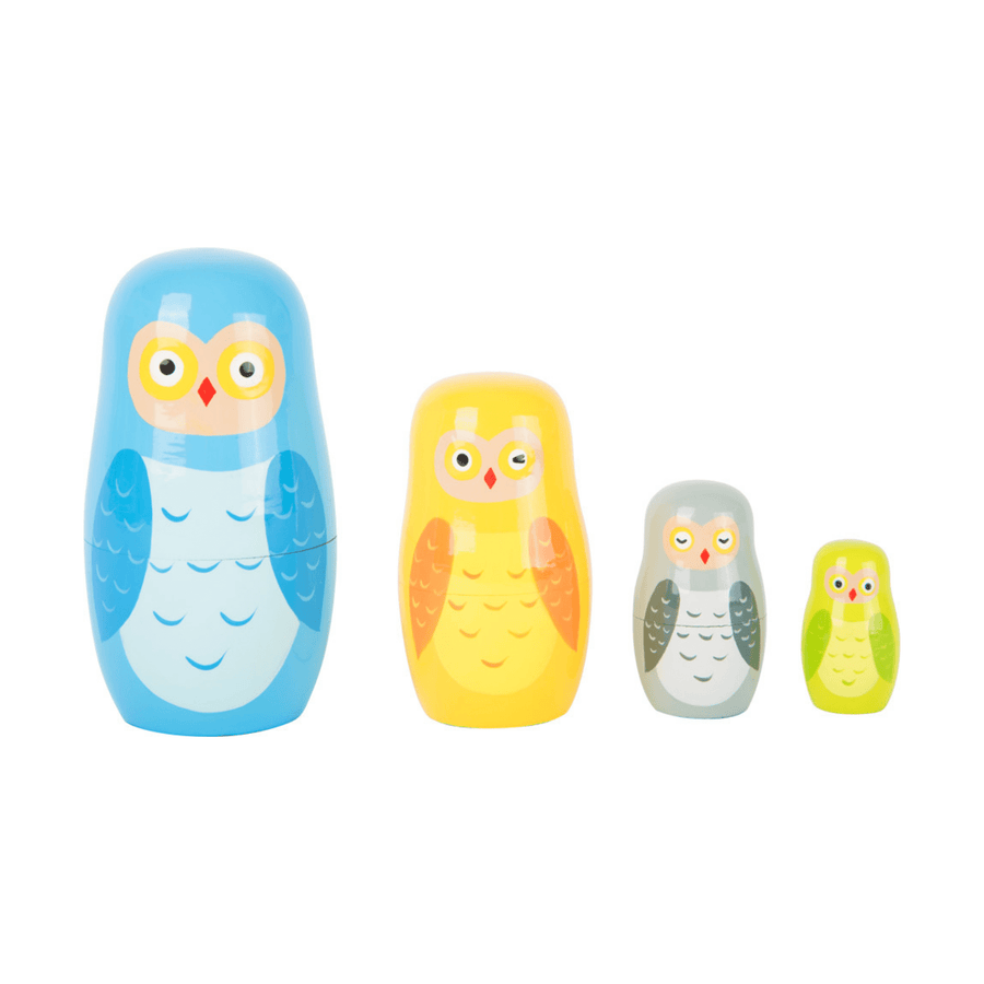 wooden russian doll style nesting owls in a line. For children age three and over