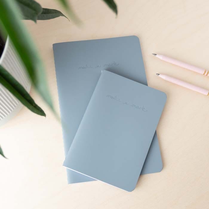 flay lay of recycled leather notebooks